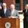Andy Van Meter, Sangamon County Chairman (left), Mike Houston, Mayor, City of Springfield at podium (center) and Ann L. Schneider, Secretary, Illinois Department of Transportation (right)