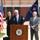 Ann L. Schneider, Secretary, Illinois Department of Transportation (left), Andy Van Meter, Sangamon County Chairman at podium (center) and Mike Houston, Mayor, City of Springfield (right)
